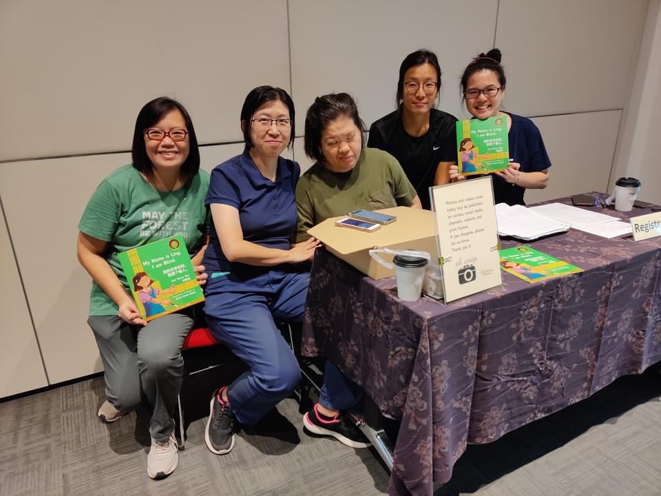 Siew Ling's blog post_HELLO SIR! at the Enabling Village_Siew Ling and volunteers at the registration table