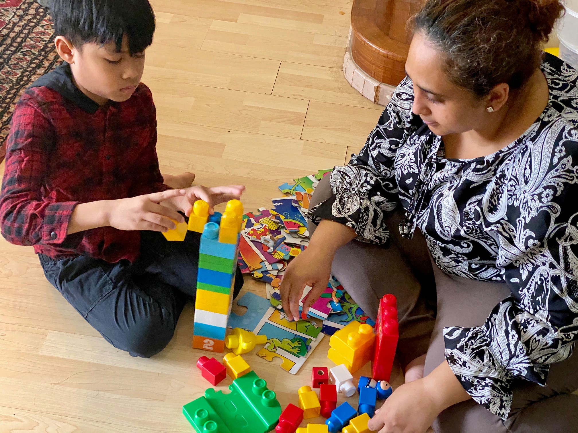 Farah says the Enabling Guide is a useful tool to search for information for both herself and her son Ilhan, who was diagnosed with ASD at the age of four. Farah playing with her son, Ilhan, using giant building blocks. Ilhan was diagnosed with ASD at age 4.
