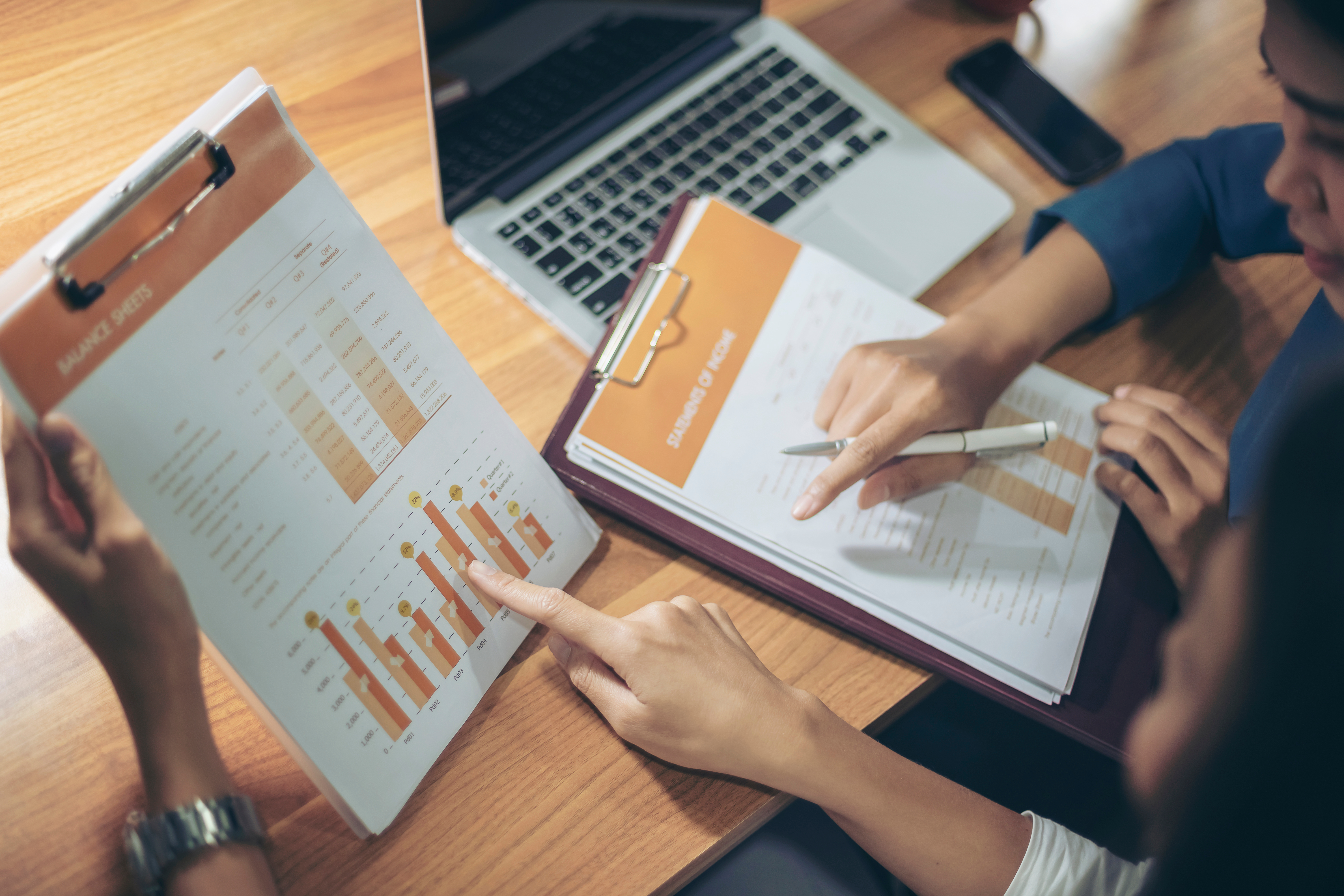 From October 2020, there will be SkillsFuture Credit top-ups for Singaporeans aged 25 and up to pick up new skills. Two women discussing financial matters at a training session