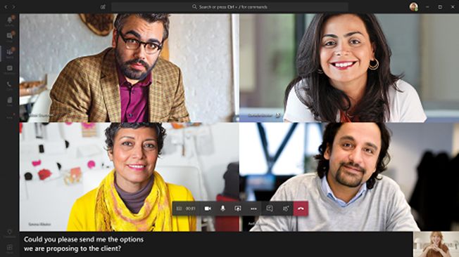 Screenshot of Microsoft Teams video conferencing platform with 4 screens of 4 persons in the meeting platform. The bottom left shows live captions displaying, "Could you please send me the options we are proposing to the client".